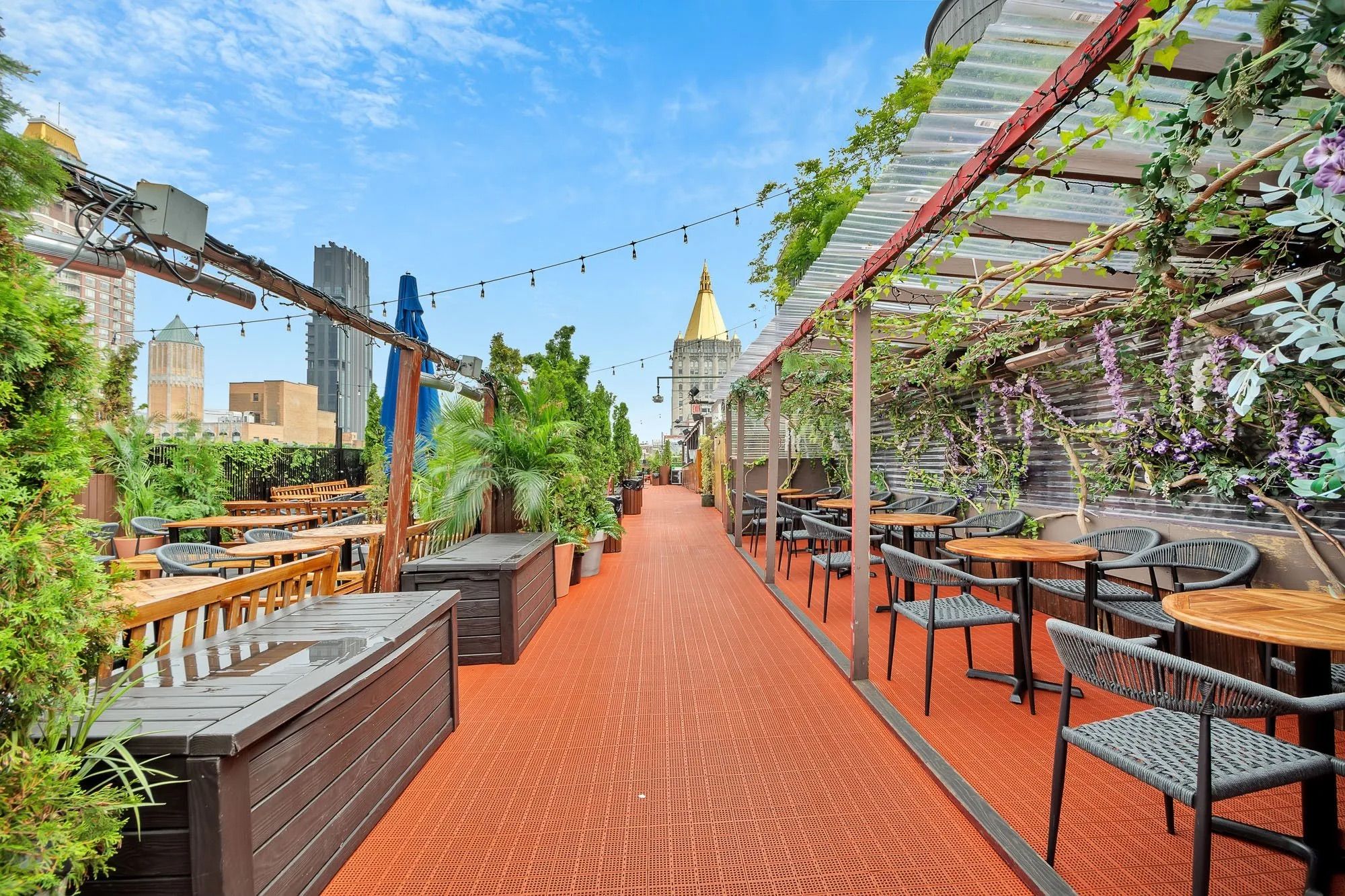 A sunny outdoor bar in Midtown with Empire State views: 230 5th Rooftop Bar1