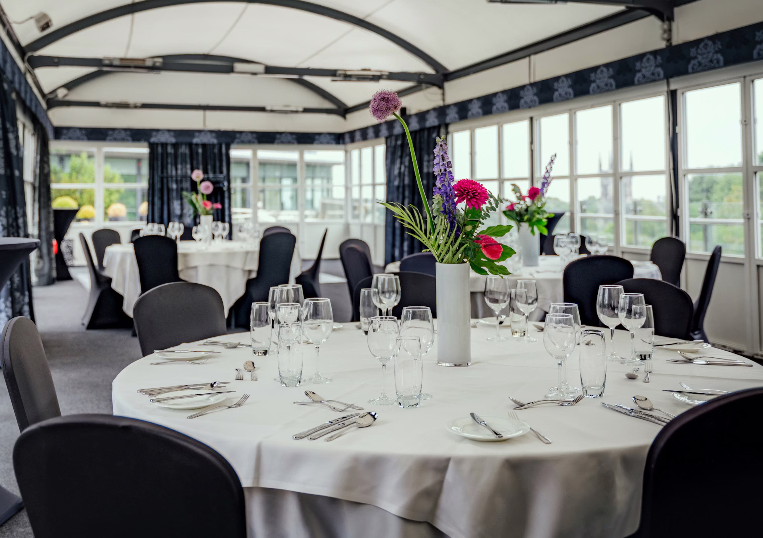 A scenic Edinburgh function room beneath Calton Hill: The Calton Suite at The Glasshouse Hotel1