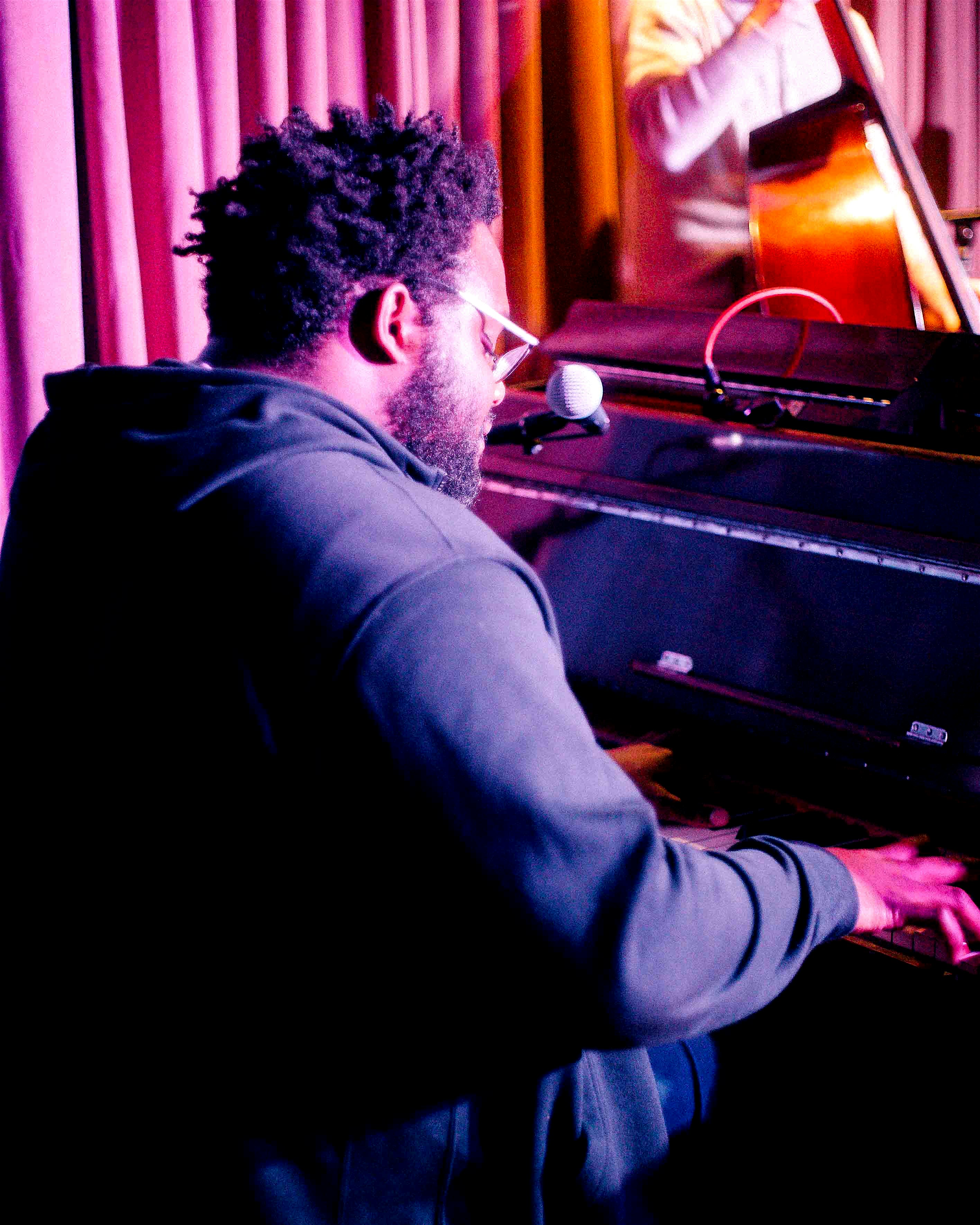 A pianist is playing and singing in a Shoreditch venue