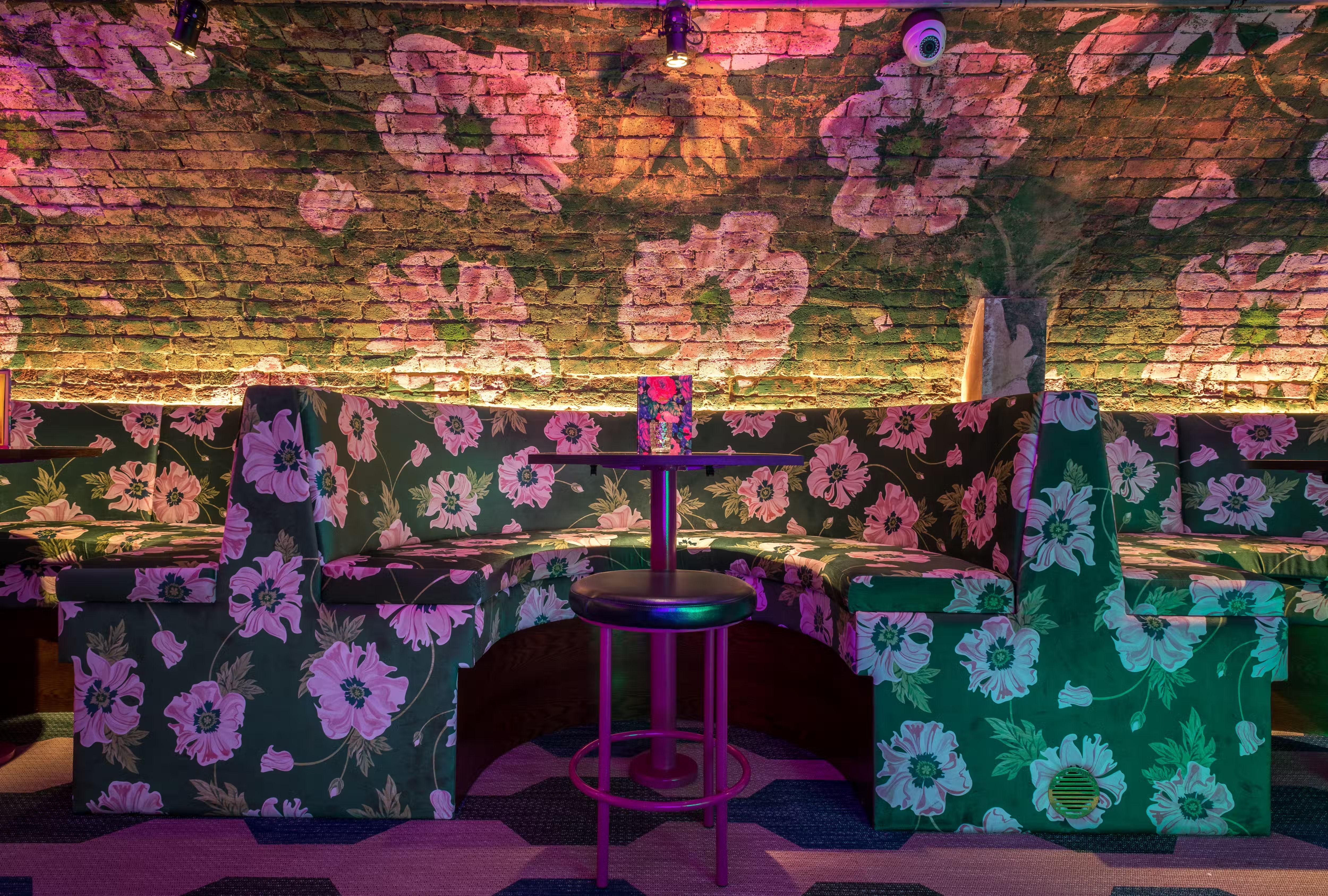 Enjoy a cocktail in Covent Garden at Blame Gloria. Photograph of floral decor.