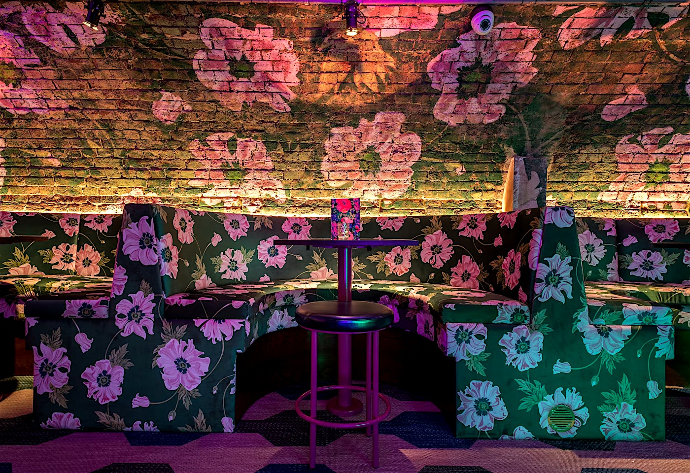 Enjoy a cocktail in Covent Garden at Blame Gloria. Photograph of floral decor.