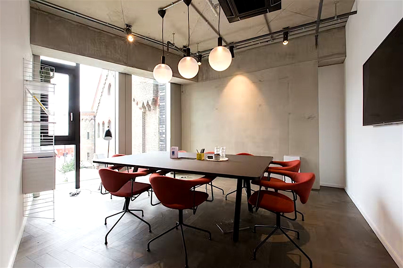 A concrete meeting room in Kings Cross, London