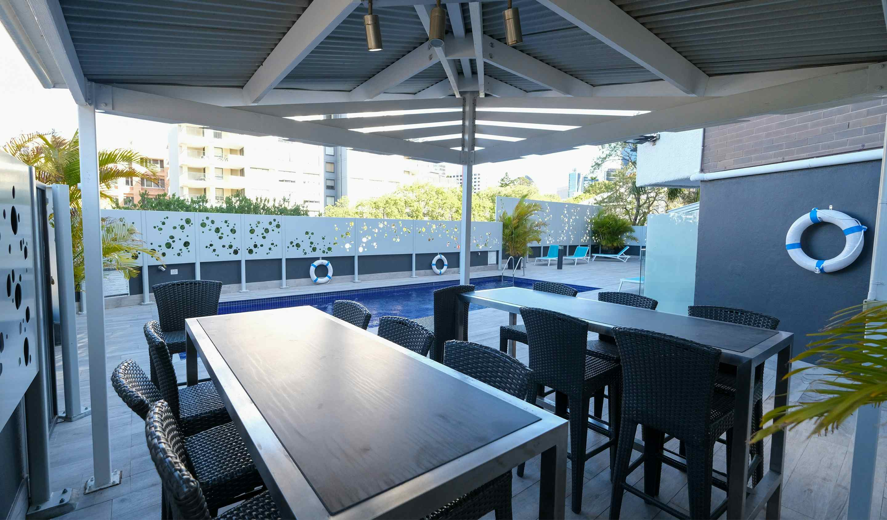 Mercure Brisbane Spring Hill | View of Table Seating Poolside | Venue Hire Brisbane | 1