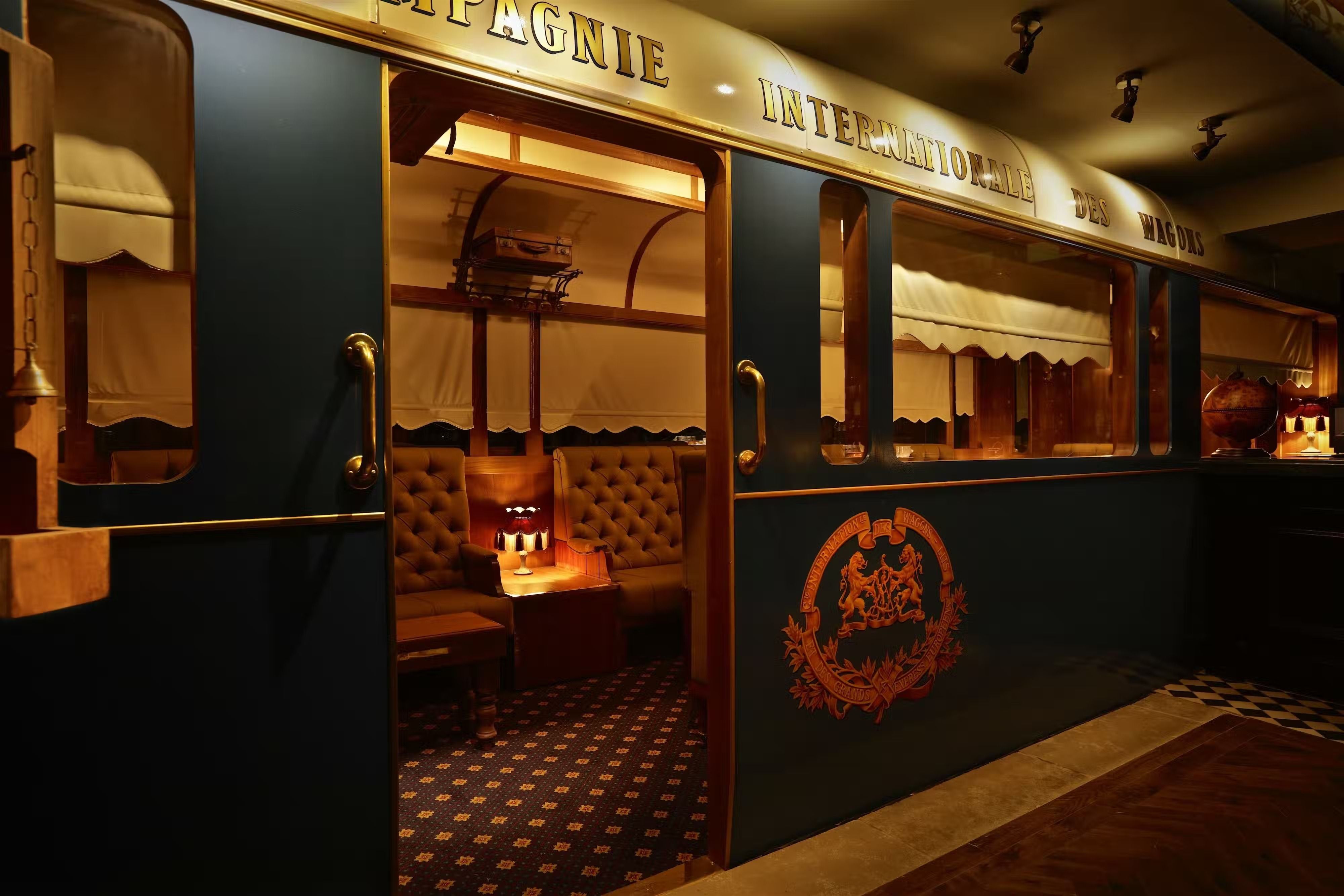 A train-carriage style area inside this Covent Garden cocktail bar