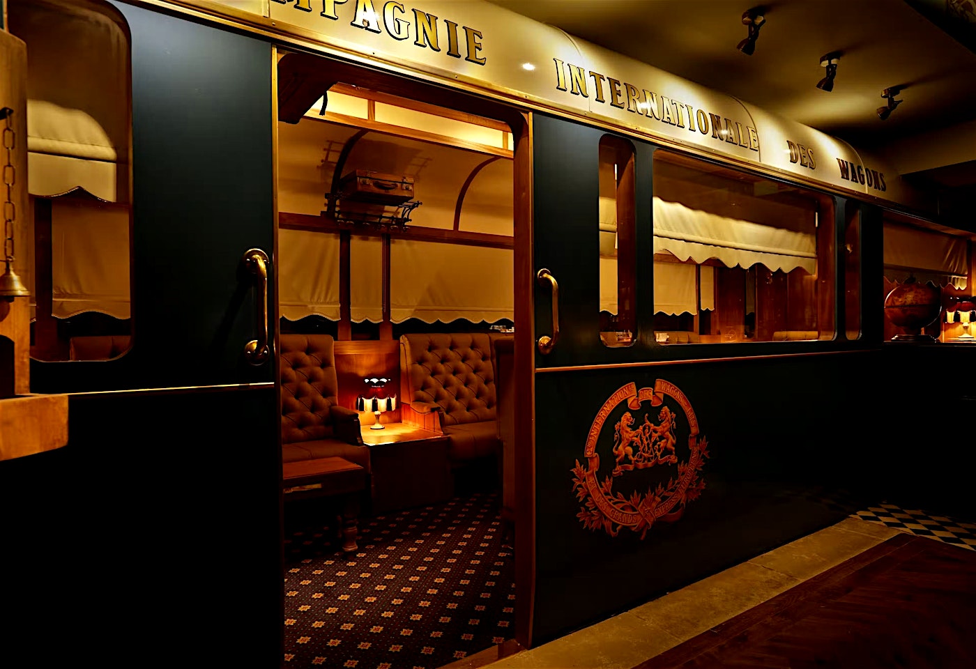A train-carriage style area inside this Covent Garden cocktail bar