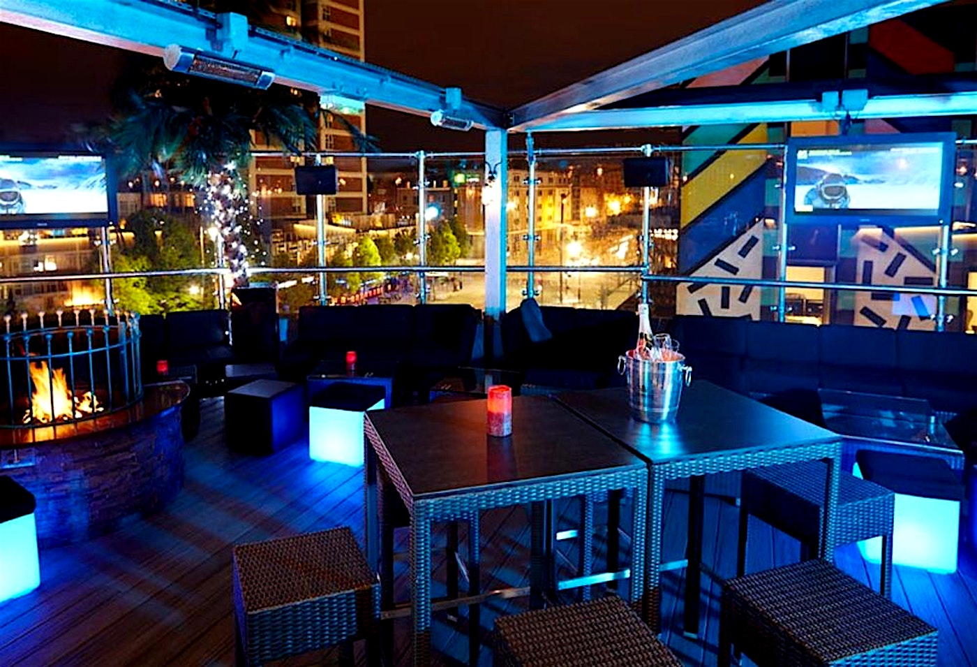 The rooftop bar at the Golden Bee, Shoreditch, east London, seen at night.