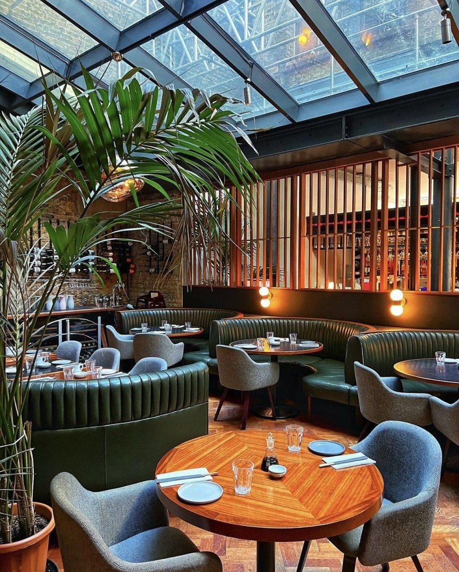 tables in apothecary east in old street in london