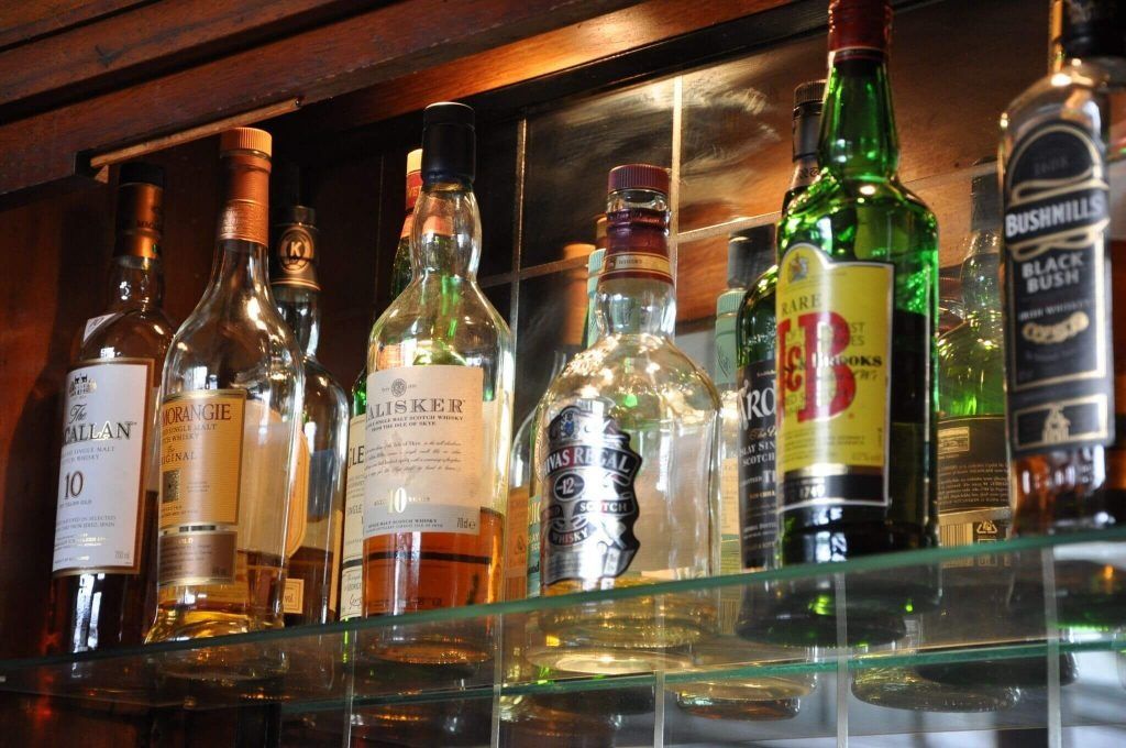 bottles in the atlas earls court london bar