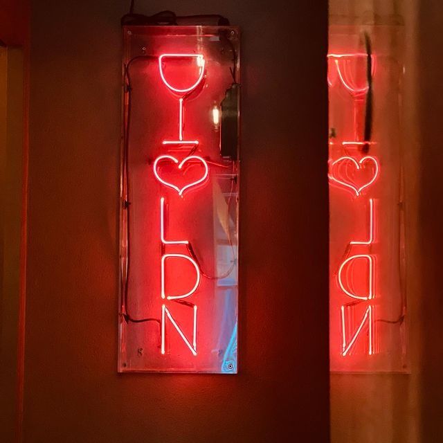 neon sign at dalla terra wine bar seven dials london bar