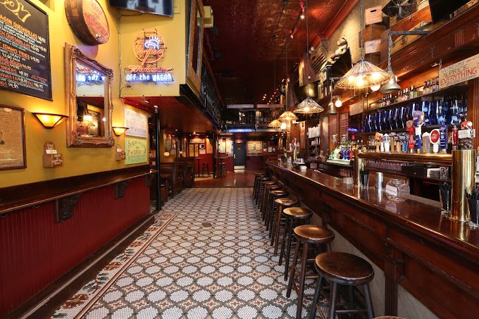The interior of Off the Wagon, one of the best bars in Manhattan, NYC.