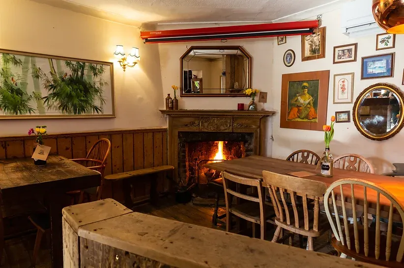 fireplace in the prince arthur pub in old street in london