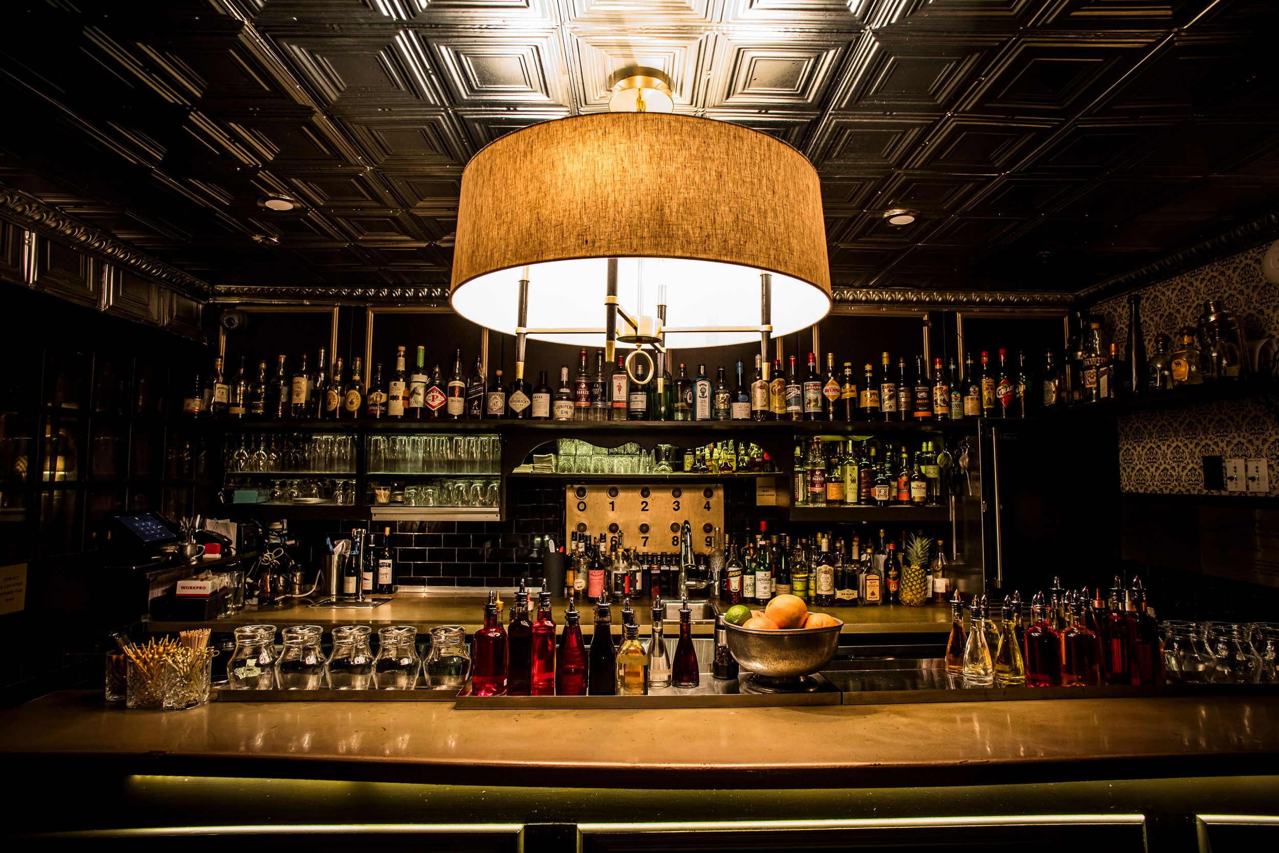 The alcohol selection at The Raines Law Room Chelsea, a bar for celebrating 21st birthdays in New York. 