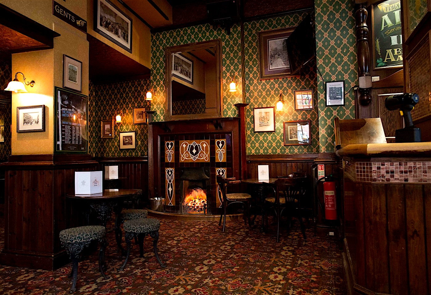 fireplace in the skinners arms pub in kings cross london