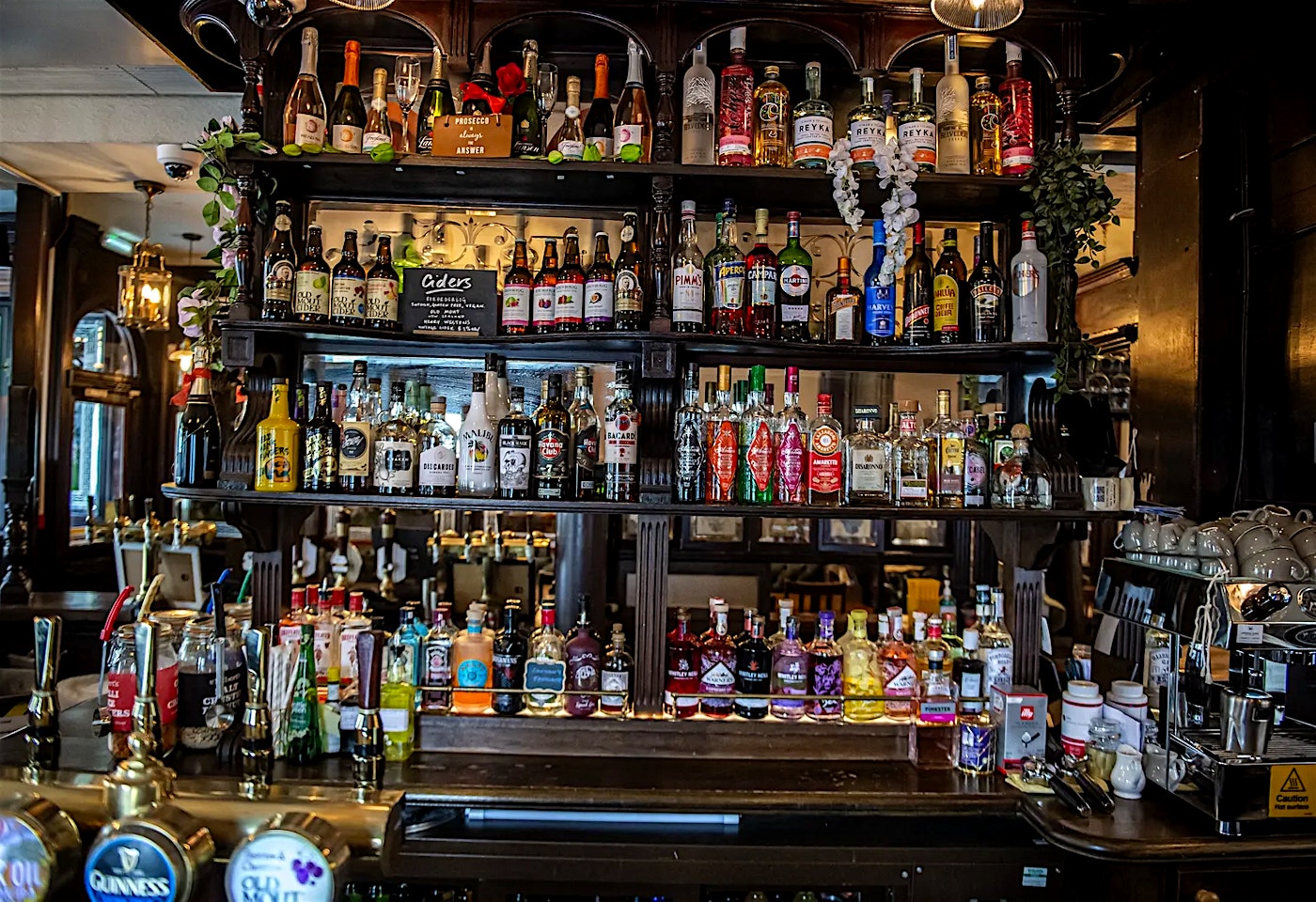 shelves behind the bar at the bunch of grapes in knightsbridge london