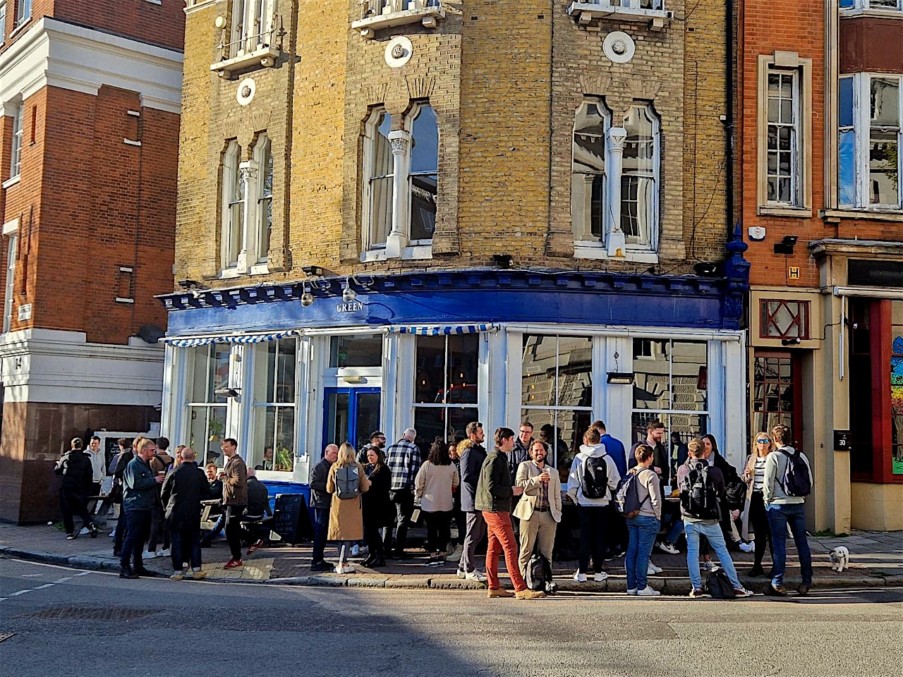 exterior of the green clerkenwell bar london with people