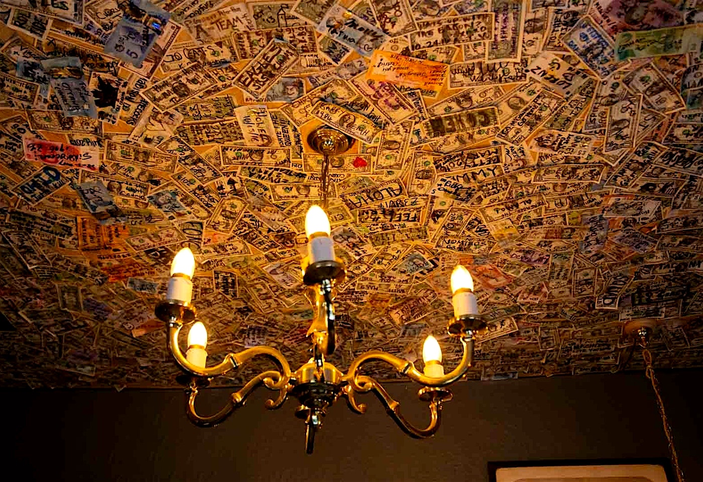 ceiling of money at grenadier belgravia london bar