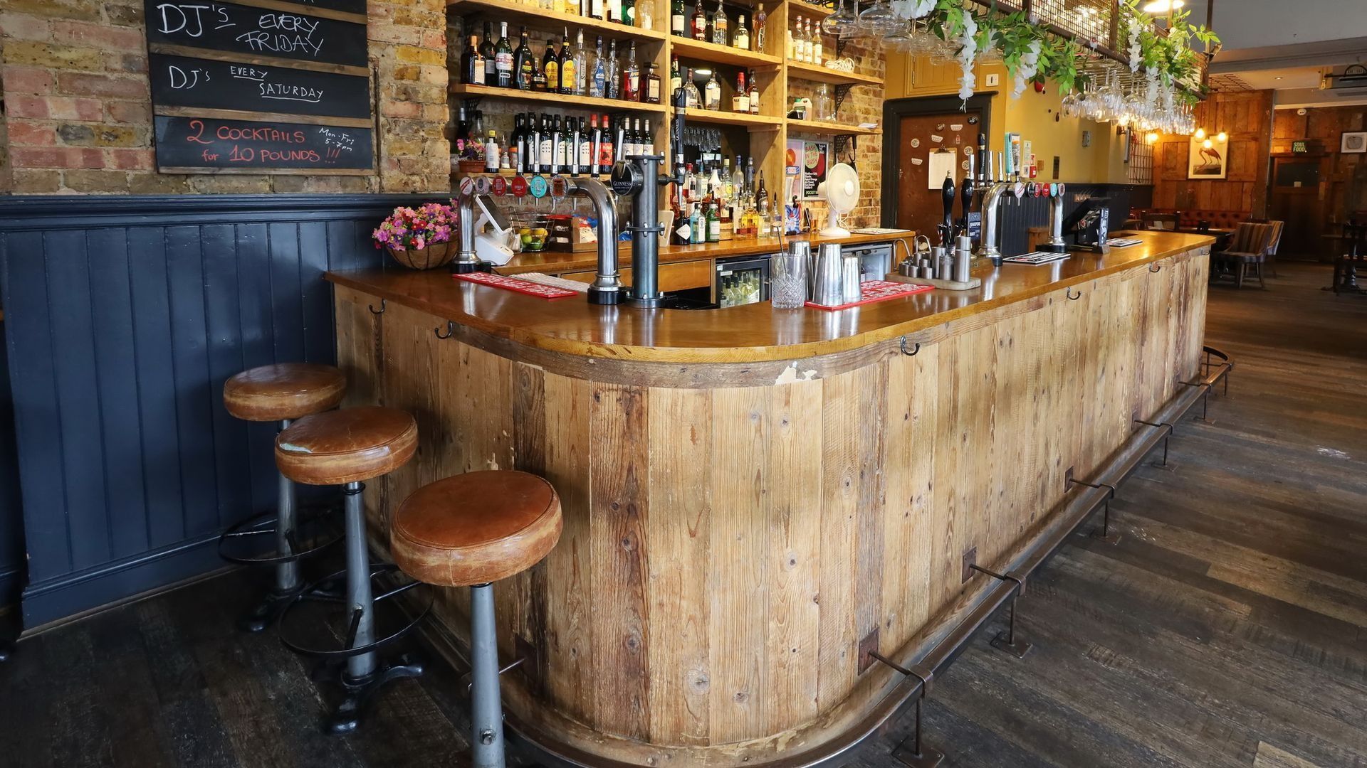 interior of the pocket watch pub in shepherds bush london bar