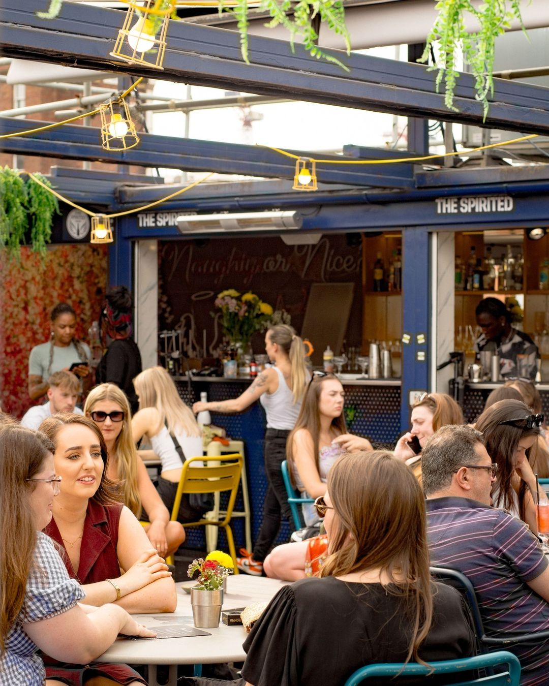 people at the spirited camden bar in camden town london