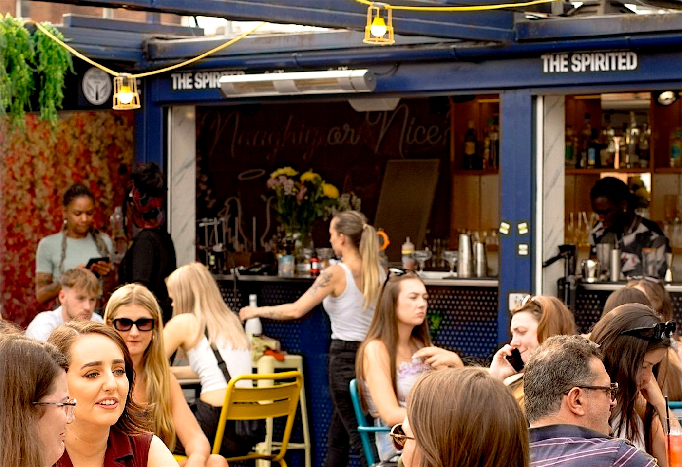 people at the spirited camden bar in camden town london